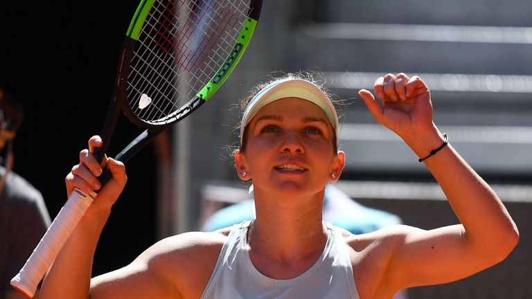Romania's Simona Halep celebrates defeating Switzerland's Belinda Bencic during their WTA Madrid Open semi-final tennis match at the Caja Magica in Madrid on May 10, 2019.