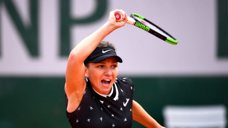 Simona Halep of Romania plays a forehand during her ladies singles first round match against Ajla Tomljanovic of Australia during Day three of the 2019 French Open at Roland Garros on May 28, 2019 in Paris, France. 