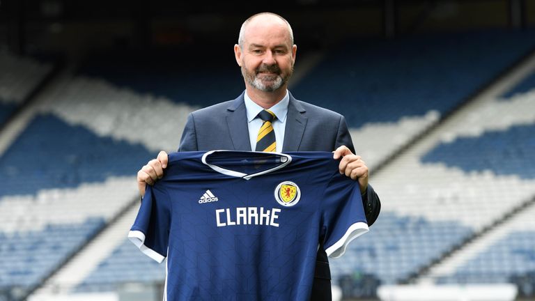 Steve Clarke pictured with Scotland shirt after being presented to the media