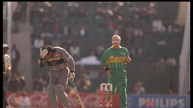 15 Feb 1996: Allan Donald of South Africa hits Sultan Zarawani of the United Arab Emirates on the head with the cricket ball during the cricket world cup in Rawalpindi, Pakistan.