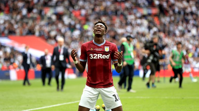 Aston Villa's Tammy Abraham celebrates promotion after winning the Sky Bet Championship Play-off final at Wembley Stadium, London. PRESS ASSOCIATION Photo. Picture date: Monday May 27, 2019. See PA story SOCCER Championship. Photo credit should read: Mike Egerton/PA Wire. RESTRICTIONS: EDITORIAL USE ONLY No use with unauthorised audio, video, data, fixture lists, club/league logos or "live" services. Online in-match use limited to 120 images, no video emulation. No use in betting, games or single club/league/player publications.