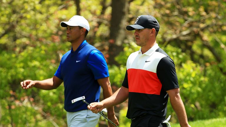 Tiger Woods and Brooks Koepka during the first round of the PGA Championship 