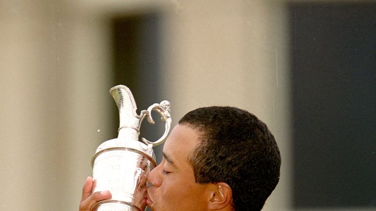 Tiger Woods kisses the Claret Jug after his 2000 Open victory 