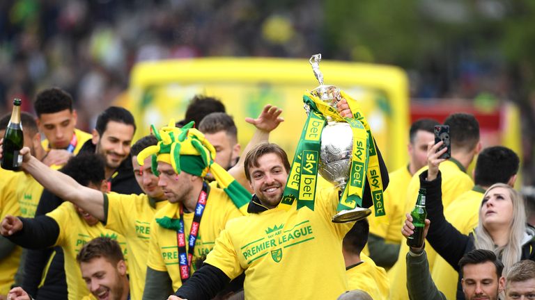 Norwich City goalkeeper Tim Krul holds the Sky Bet Championship trophy during the promotion parade in Norwich City