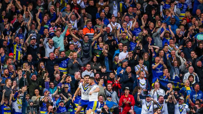 Toby King celebrates his try for Warrington with Tom Lineham.