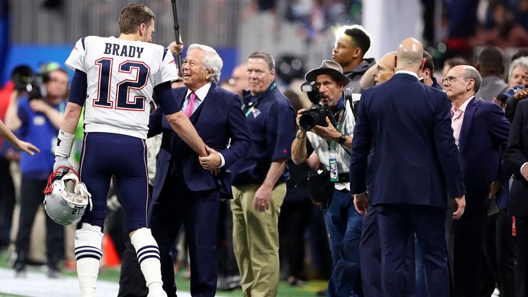 New England Patriots owner Robert Kraft shakes the hand of quarterback Tom Brady at the Super Bowl LIII
