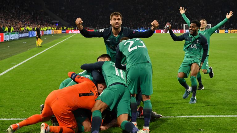 Spurs players celebrate beating Ajax after the final whistle