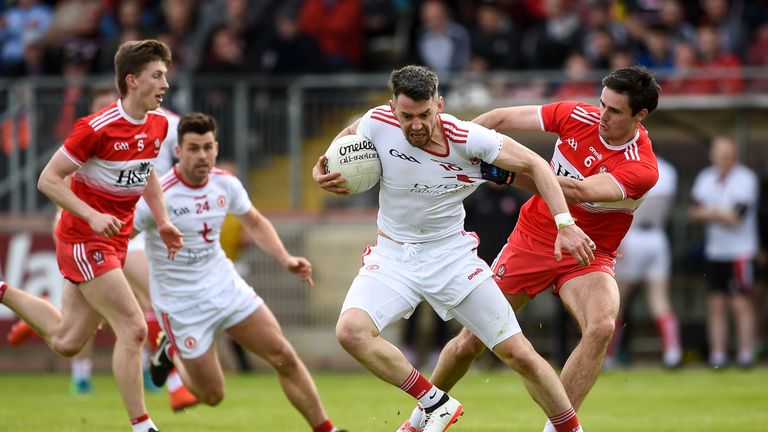 Matthew Donnelly of Tyrone in action against Christopher McKaigue of Derry during the Ulster GAA Football Senior Championship preliminary round match