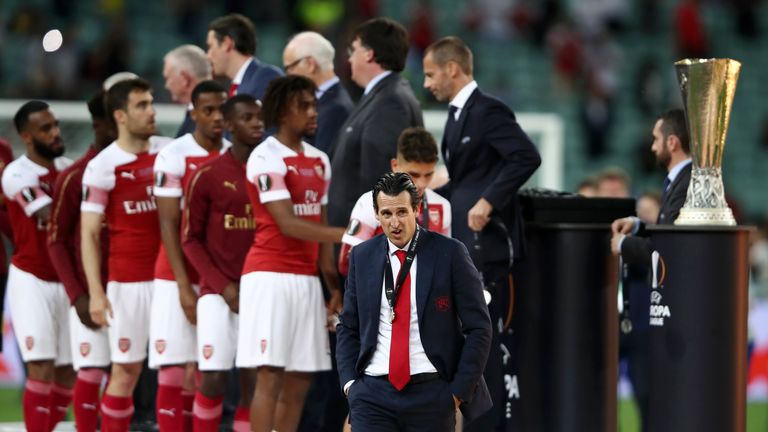 Unai Emery and his players look dejected after Europa League final defeat