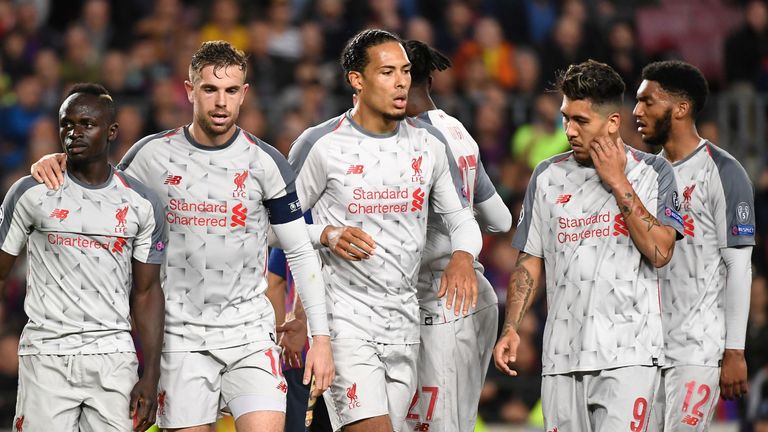Virgil van Dijk and Jordan Henderson react with Liverpool team-mates during their 3-0 defeat at Barcelona 