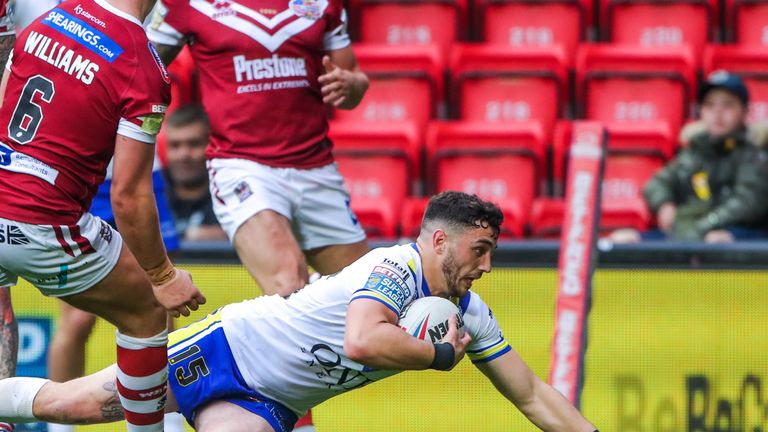 Warrington's Declan Patton scores a try.