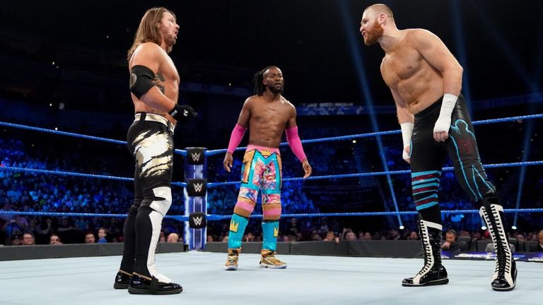 kofi kingston defends title against sami zayn and aj styles