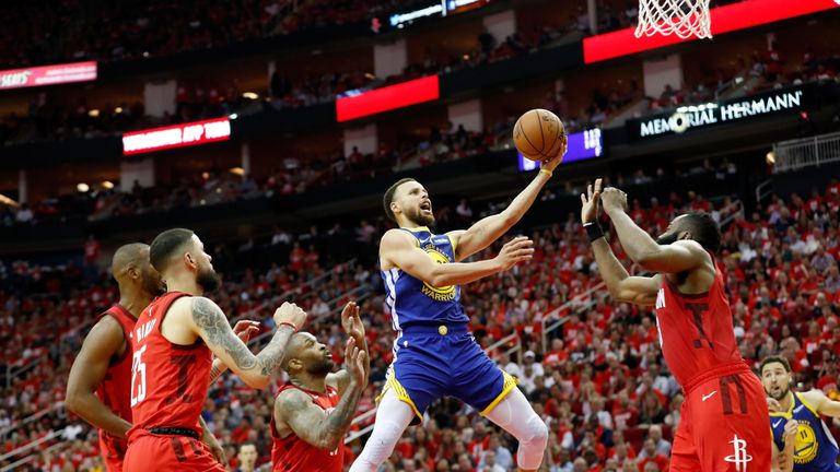 Stephen Curry scores at the rim during the Golden State Warriors' Game 4 loss to the Houston Rockets