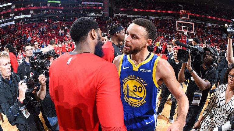 Stephen Curry shares a moment with James Harden after the Golden State Warriors eliminated the Houston Rockets from the playoffs