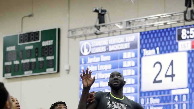 Tacko Fall contests a rebound at the NBA Combine