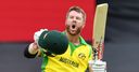 Warner hits ton as Aussies win thriller