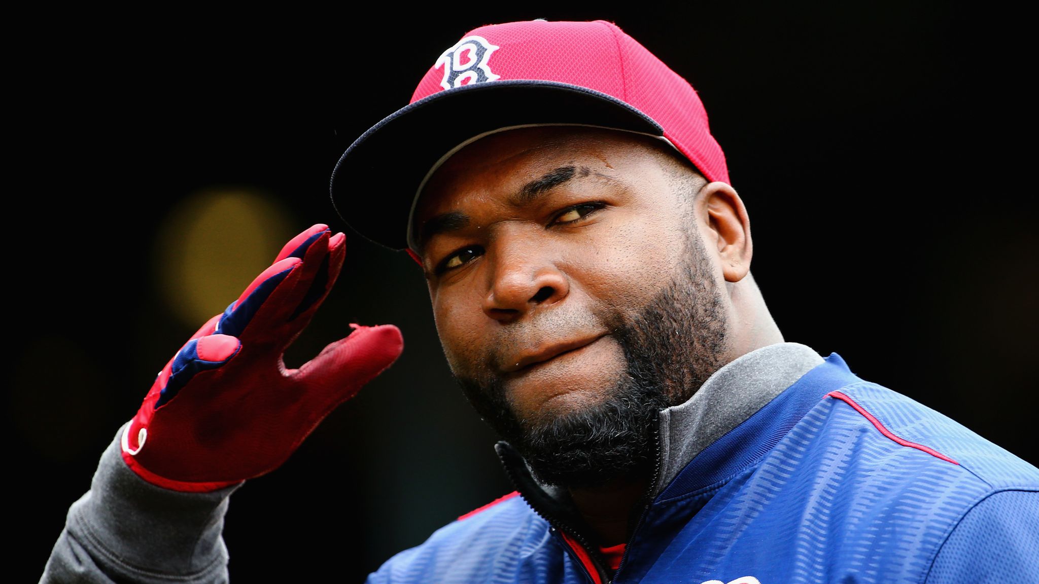 The Dominican Republic's designated hitter David Ortiz waves his country's  flag after helping defeat Venezuela, 11-5, during their Round 1 World  Baseball Classic game in Lake Buena Vista, Fla., Tuesday, March 7