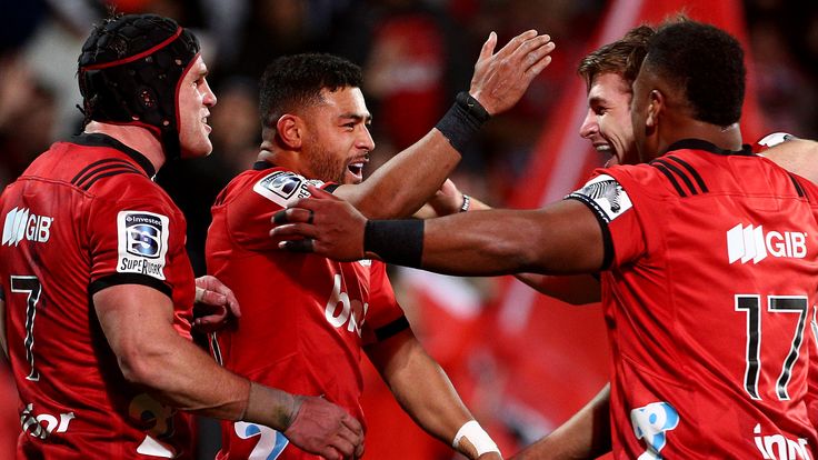 CHRISTCHURCH, NEW ZEALAND - JUNE 21: Richie Mo'unga of the Crusaders celebrates his try with team-mates during the Super Rugby Quarter Final match between the Crusaders and the Highlanders at AMI Orangetheory on June 21, 2019 in Christchurch, New Zealand. (Photo by Dianne Manson/Getty Images)
