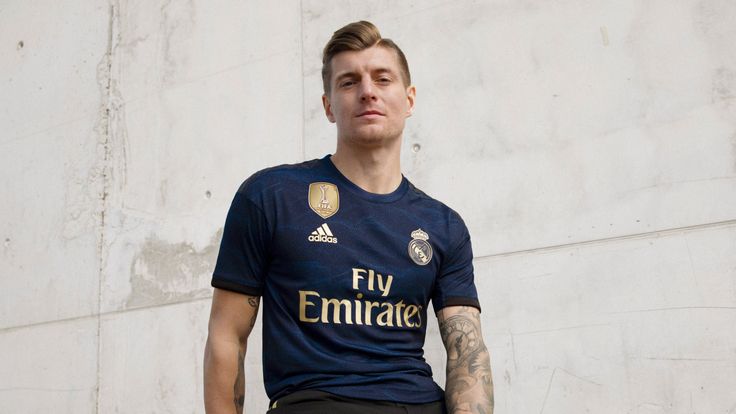 Toni Kroos models Real Madrid's new away shirt