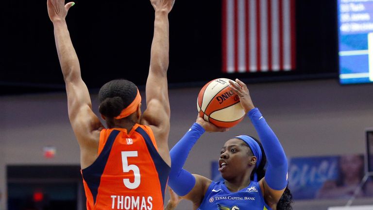 Arike Ogunbowale fires a three against Connecticut Sun 