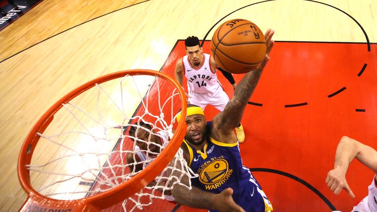 DeMarcus Cousins rises towards the Raptors' basket during Game 2