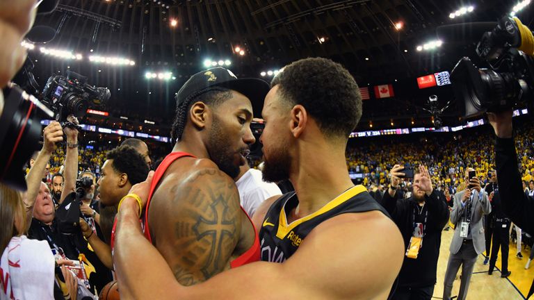 Kawhi Leonard and Stephen Curry embrace after the Raptors seal NBA Finals victory over the Warriors