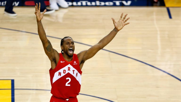 Kawhi Leonard celebrates at the buzzer as the Toronto Raptors complete a 4-2 series victory over the Golden State Warriors in the NBA Finals