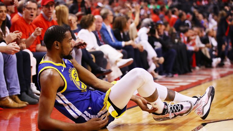 Kevin Durant pictured after aggravating a lower leg injury in Game 5 of the NBA Finals