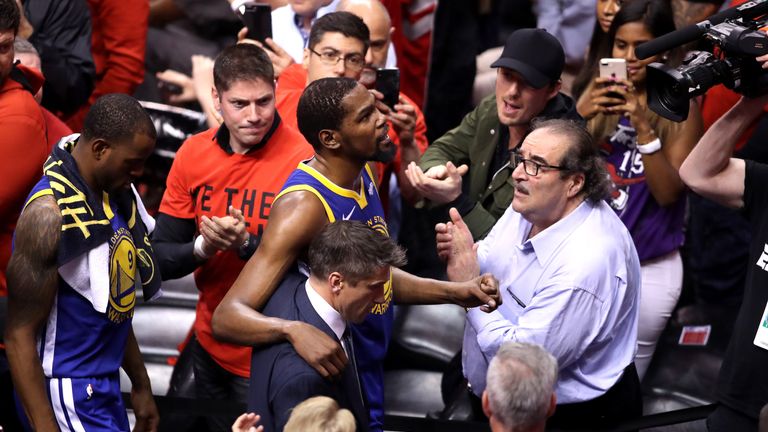 Kevin Durant leaves the court after suffering an Achilles injury in Game 5 of the NBA Finals