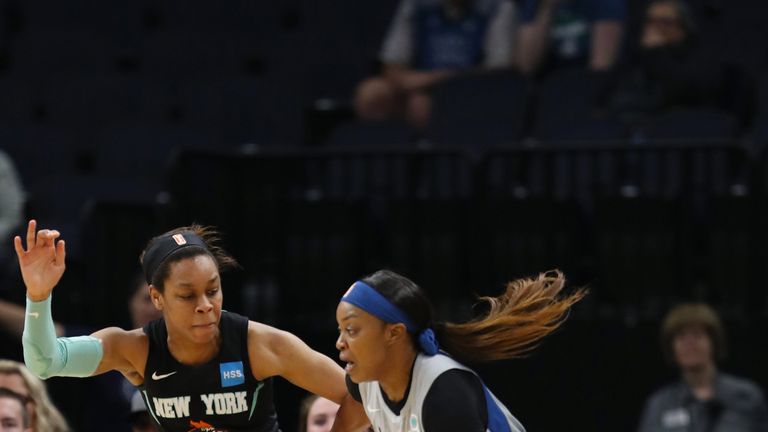 Odyssey Sims drives at the New York Liberty defense