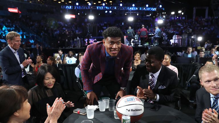 Rui Hachimura bows after being selected by the Washington Wizards