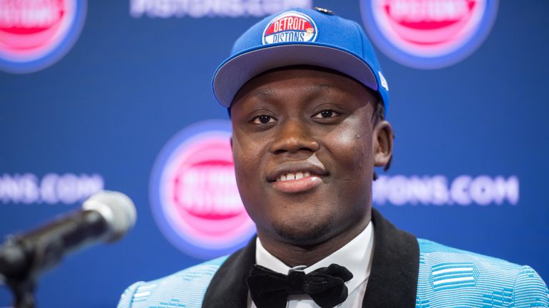 Sekou Doumbouya poses for pictures after being taken at No 15 in the NBA Draft