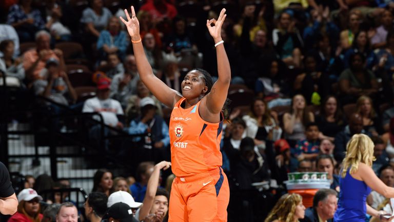Shekinna Stricklen celebrates one of her seven triples against the Atlanta Dream