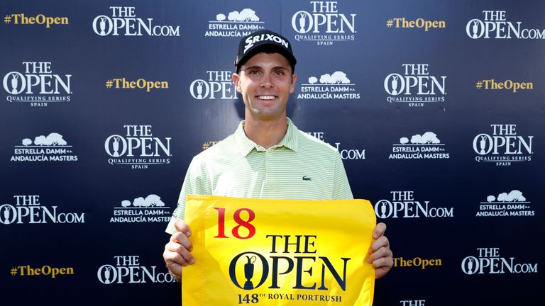 Adri Arnaus of Spain poses with an Open Championship flag after securing a place at the 2019 Open Championship during day four of the Estrella Damm N.A. Andalucia Masters hosted by the Sergio Garcia Foundation at Real Club Valderrama