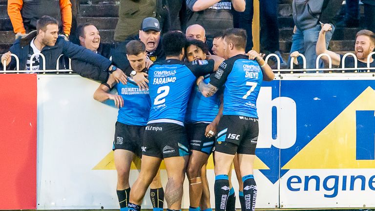 Kelly is congratulated on his try against Castleford during Round 18