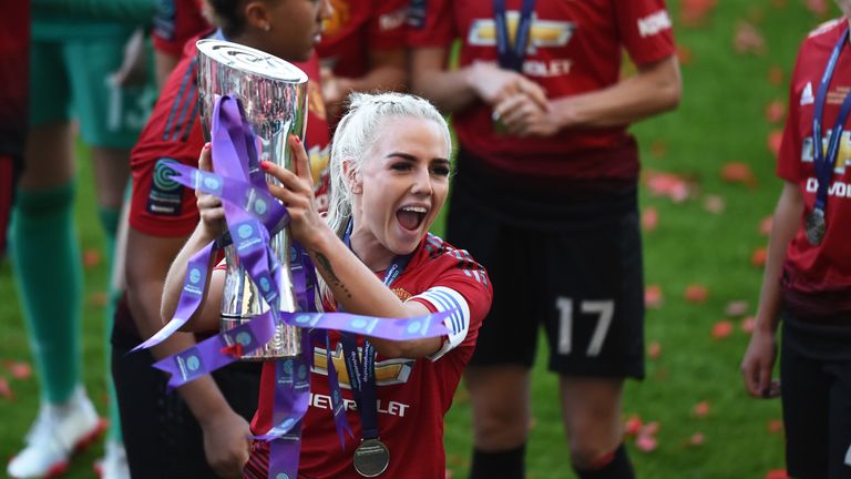 LEIGH, GREATER MANCHESTER - MAY 11: Alex Greenwood of Manchester United Women celebrates after they win Women's Super League 2 trophy after the match between Manchester United Women and Lewes Women at Leigh Sports Village on May 11, 2019 in Leigh, Greater Manchester. (Photo by Nathan Stirk/Getty Images)