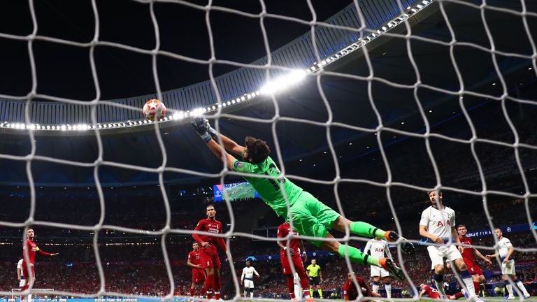 Alisson made a fine late save to keep out Christian Eriksen's free-kick