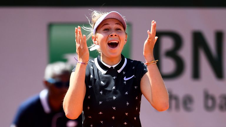 Amanda Anisimova of The United States celebrates victory during her ladies singles quarter-final match against Simona Halep of Romania during Day twelve of the 2019 French Open at Roland Garros on June 06, 2019 in Paris, France.