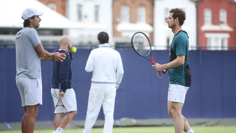 Andy Murray and Feliciano Lopez on the practice courts at Queen's Club this week 