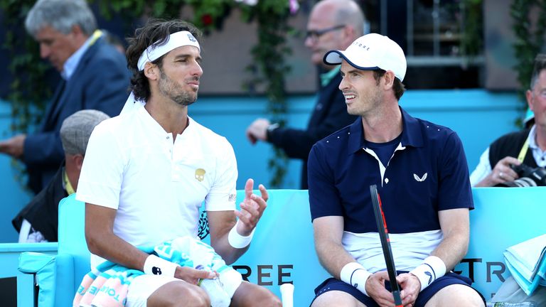 Andy Murray of Great Britain and partner Feliciano Lopez of Spain in conversation after their doubles quarter-final match against Ken Skupski of Great Britain and Daniel Evans of Great Britain during day six of the Fever-Tree Championships at Queens Club on June 22, 2019 in London,