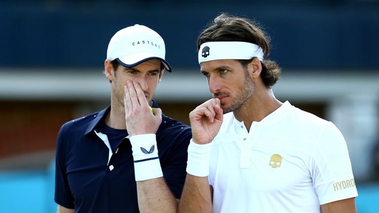 Andy Murray of Great Britain and partner Feliciano Lopez of Spain in conversation during their doubles quarter-final match against Ken Skupski of Great Britain and Daniel Evans of Great Britain during day six of the Fever-Tree Championships at Queens Club on June 22, 2019 in London, United Kingdom.