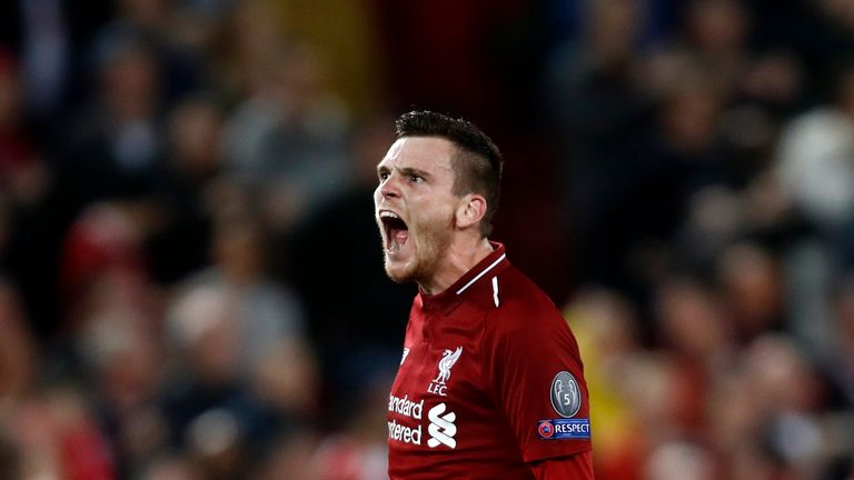 Andy Robertson of Liverpool celebrates victory after the Group C match of the UEFA Champions League between Liverpool and Paris Saint-Germain at Anfield on September 18, 2018 in Liverpool, United Kingdom.