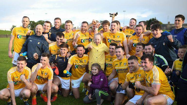 Antrim players celebrate at full-time