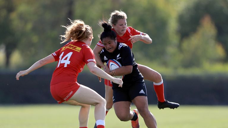 CHULA VISTA, CALIFORNIA - JUNE 28: Ayesha Leti-I'iga of New Zealand eludes Paige Farries and Brianna Miller of Canada during the Women's Rugby Super Series 2019 match between Canada and New Zealand at the Chula Vista Elite Athlete Training Center on June 28, 2019 in Chula Vista, California. (Photo by Sean M. Haffey/Getty Images)