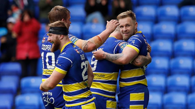 Warrington Wolves' Blake Austin (right) celebrates his try against Catalans Dragons, during the Betfred Super League match at The Halliwell Jones Stadium, Warrington. PRESS ASSOCIATION Photo. Picture date: Saturday June 8, 2019. See PA story RUGBYL Warrington. Photo credit should read: Martin Rickett/PA Wire. RESTRICTIONS: Editorial use only. No commercial use. No false commercial association. No video emulation. No manipulation of images.