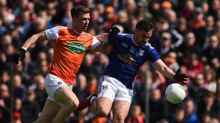 Niall Murray of Cavan in action against Paul Hughes of Armagh