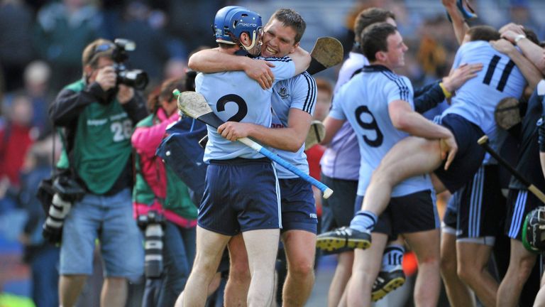 Corcoran and Keaney embrace after the 2011 National League triumph