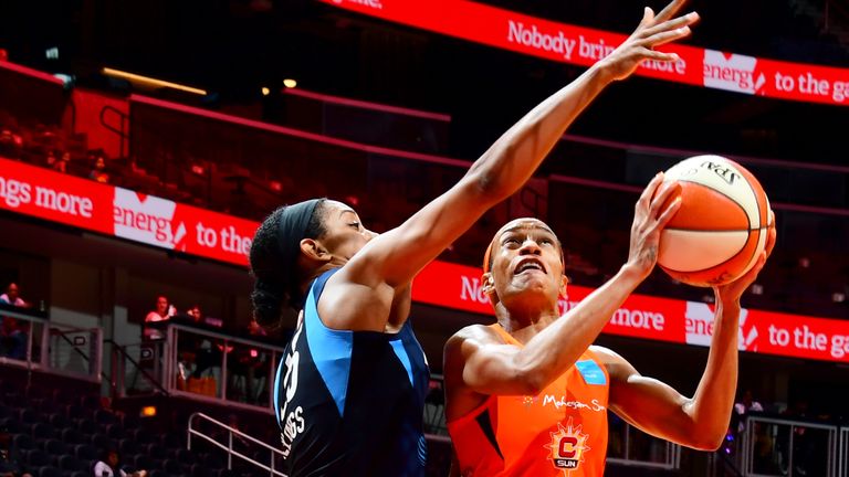 Jasmine Thomas #5 of Connecticut Sun goes to the basket against the Atlanta Dream on June 9, 2019 at the State Farm Arena in Atlanta, Georgia.