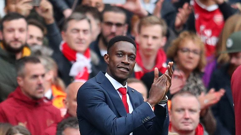 Danny Welbeck of Arsenal applauds fans as he walks through the guard of honour following the Premier League match between Arsenal FC and Brighton & Hove Albion at Emirates Stadium on May 05, 2019 in London, United Kingdom.