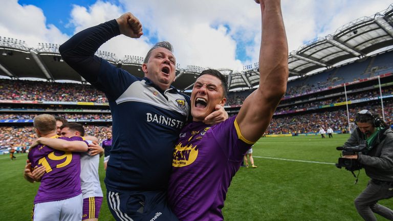 Fitzgerald celebrates with Lee Chin at full-time